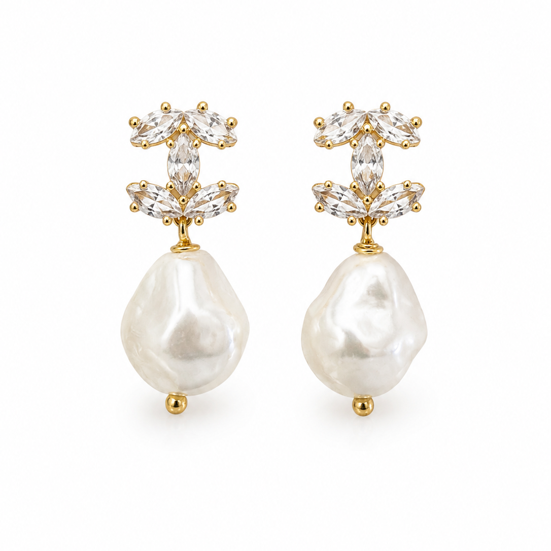 Aretes Chanel.