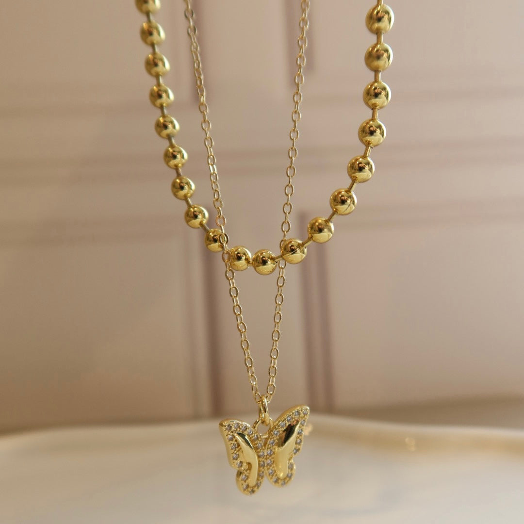 Collar doble Mariposa.