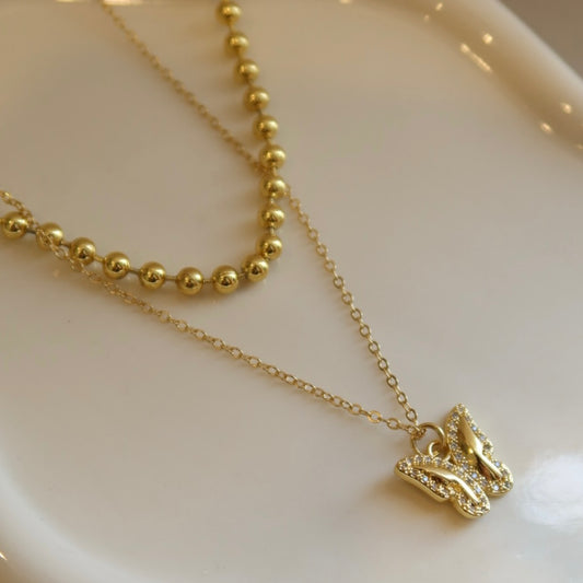 Collar doble Mariposa.