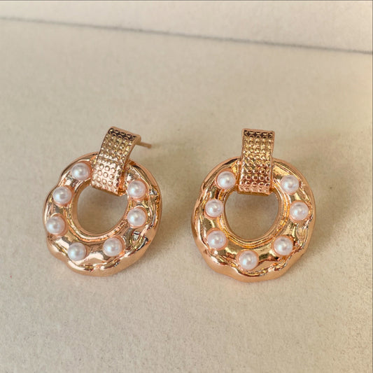 Aretes Rose.