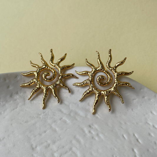 Aretes Sol.